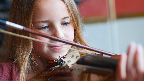 Child playing the violin